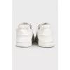 White sneakers with logo
