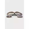 Blue flip-flops with a signature print