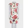 White dress with floral print and decoration