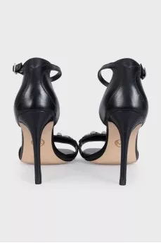 Black leather sandals with silver logo