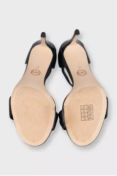 Black leather sandals with silver logo