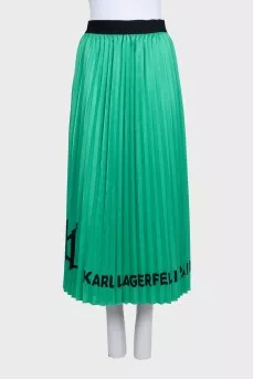 Green pleated skirt with logo