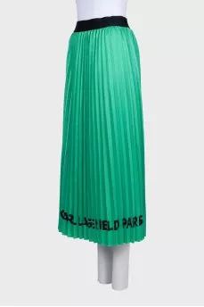 Green pleated skirt with logo