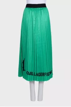 Green pleated skirt with logo