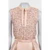 Beige dress with a decorated top