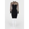 Black dress with a leopard print on sleeves