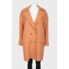 Woolen brown coat on golden buttons