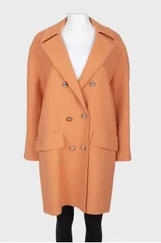 Woolen brown coat on golden buttons