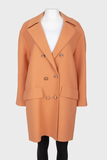 Woolen brown coat on golden buttons
