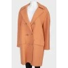 Woolen brown coat on golden buttons