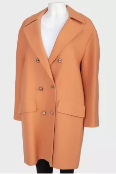 Woolen brown coat on golden buttons