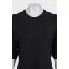 Black straight dress with pleated hem