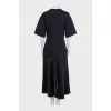 Black straight dress with pleated hem