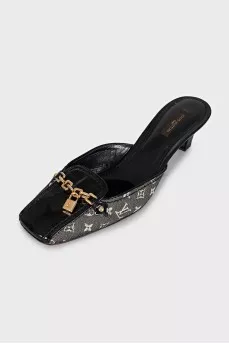 Black mules with metallic decor
