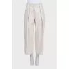 Брюки багі бежевого кольору прямого крою