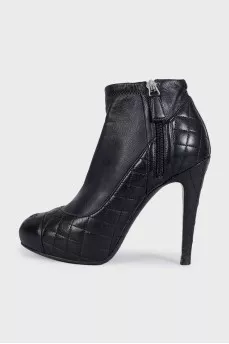 Black quilted ankle boots with logo