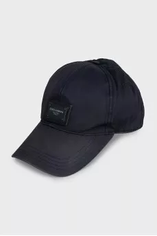 Men's blue cap with a brand logo