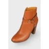 Red buckle ankle boots