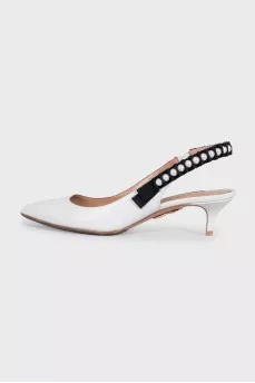 White leather slingbacks with embellished straps