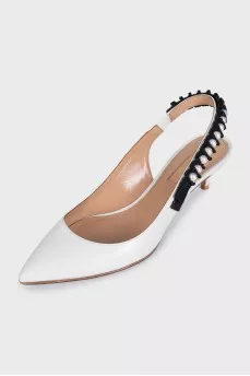 White leather slingbacks with embellished straps