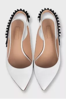 White leather slingbacks with embellished straps