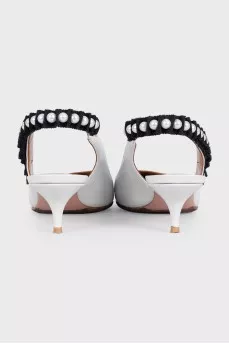 White leather slingbacks with embellished straps