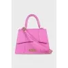 Pink satchel with gold logo