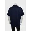 Men's button-down polo shirt with tag