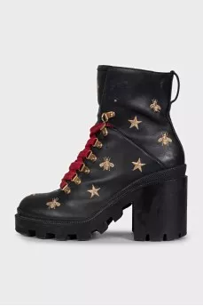 Leather ankle boots with gold embroidery