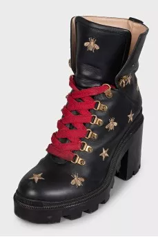 Leather ankle boots with gold embroidery