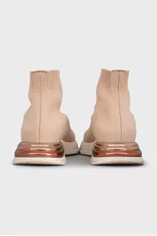 Beige sneakers with elastic bands