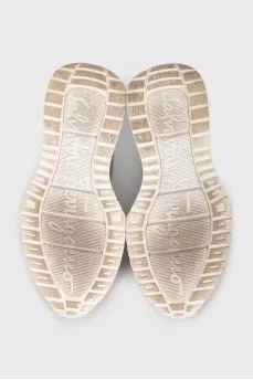 Beige sneakers with elastic bands