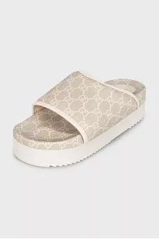 Beige canvas slides with tag