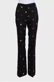 Black suit with trousers decorated with embroidery