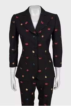 Black suit with trousers decorated with embroidery