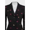Black suit with trousers decorated with embroidery