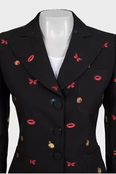 Black suit with trousers decorated with embroidery