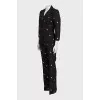 Black suit with trousers decorated with embroidery