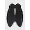 Black and white textile slip-ons