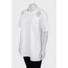 T-shirt with cutout shoulders and tag
