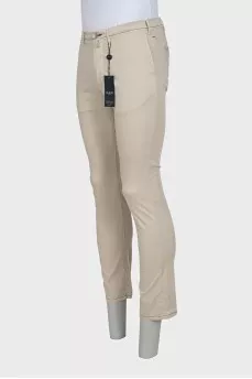 Men's beige tapered trousers with tag