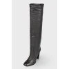 Black leather boots with a dumb sock