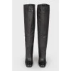 Black leather boots with a dumb sock