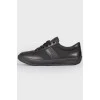 Black leather lace up sneakers