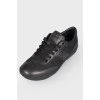 Black leather lace up sneakers