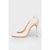 White leather stilettos