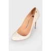 White leather stilettos