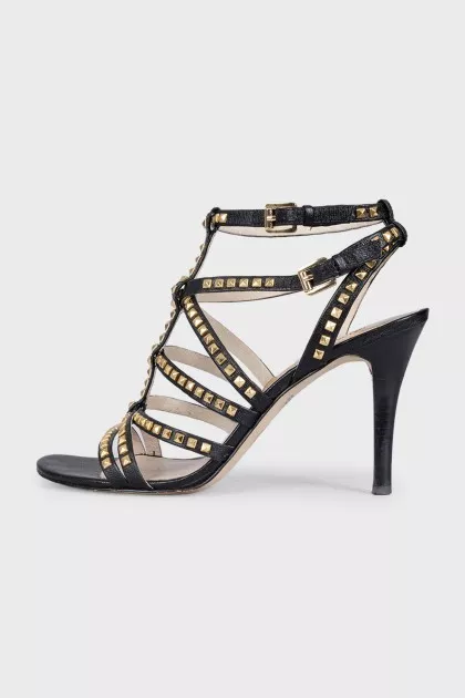 Leather sandals with gold-tone heel embellishments