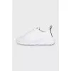 White sneakers with accent decor