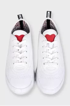 White sneakers with accent decor
